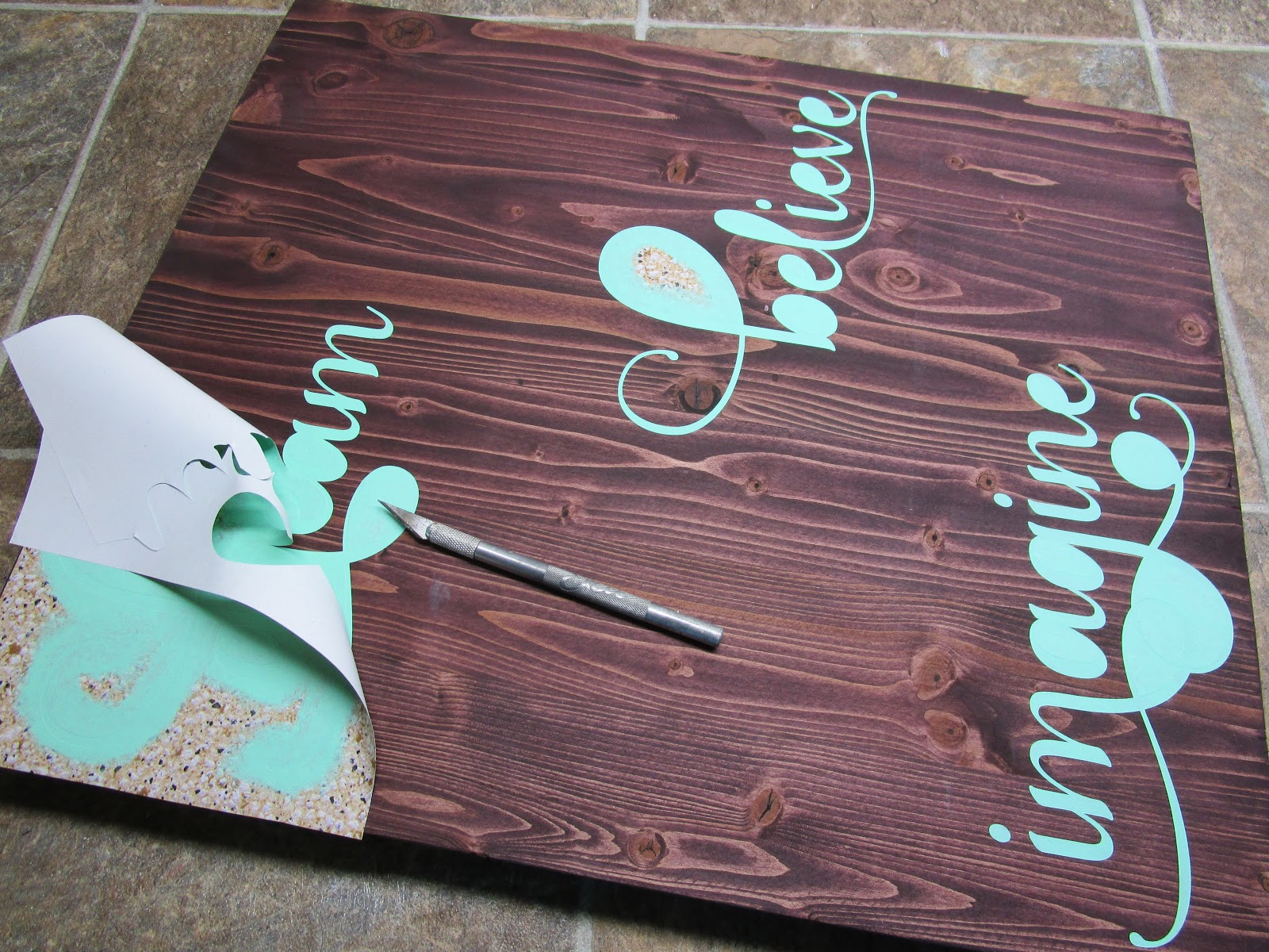 Northwoods Attic How to Create a Painted Wood Sign with Glitter Heat Transfer Vinyl Tutorial
