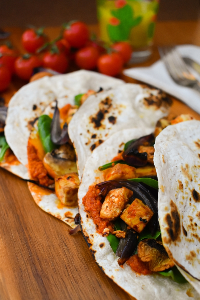 Homemade soft, warm tacos filled with a roasted pepper tapenade, salad leaves, roast spiced tofu, roast red onions and roast mushrooms. A delicious vegetarian or vegan dinner that your family will love. Includes photos and a printable recipe.
