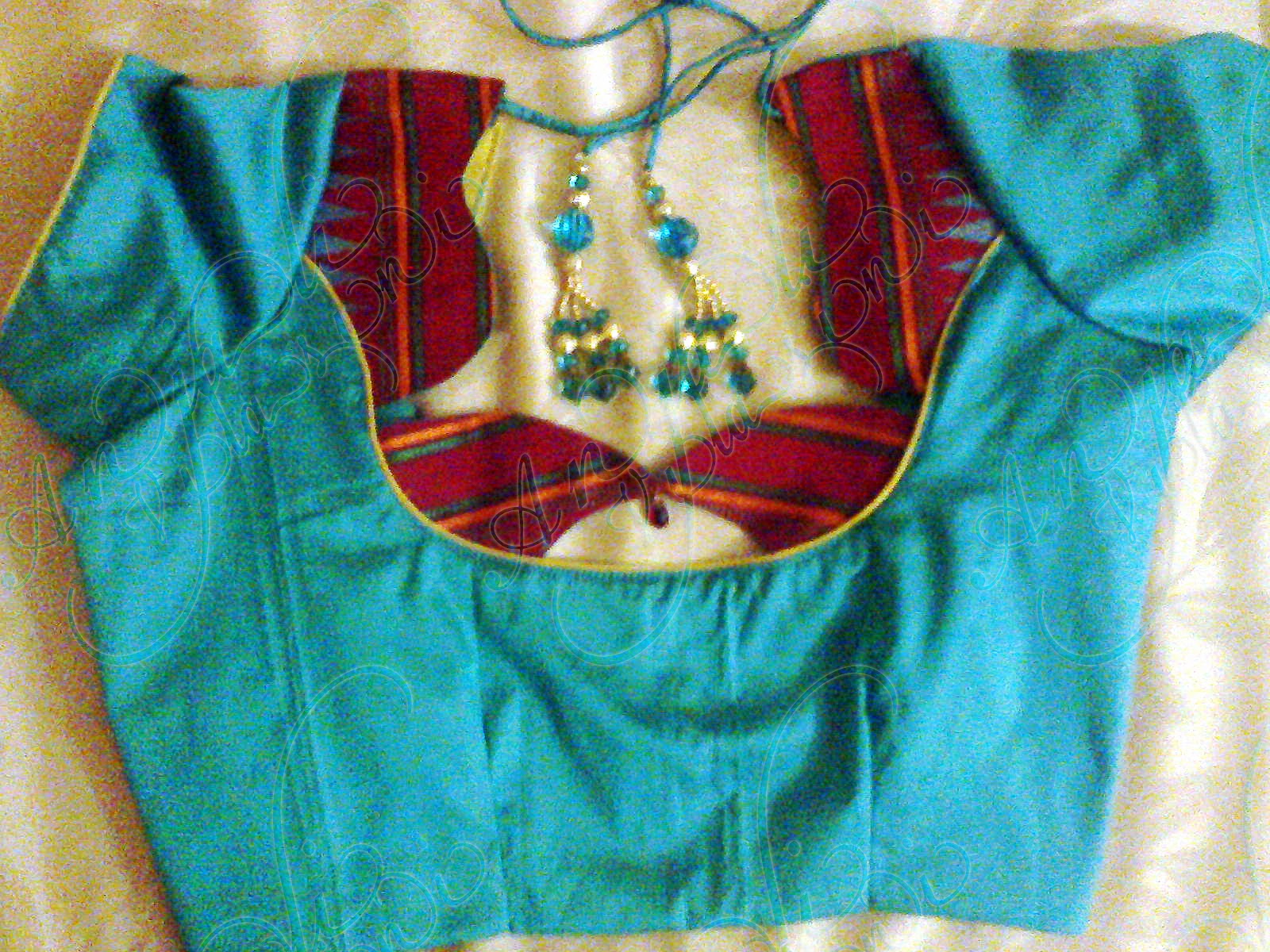 Anjali Vilasini: saree blouse designs1( sky blue silk blouse with red design)