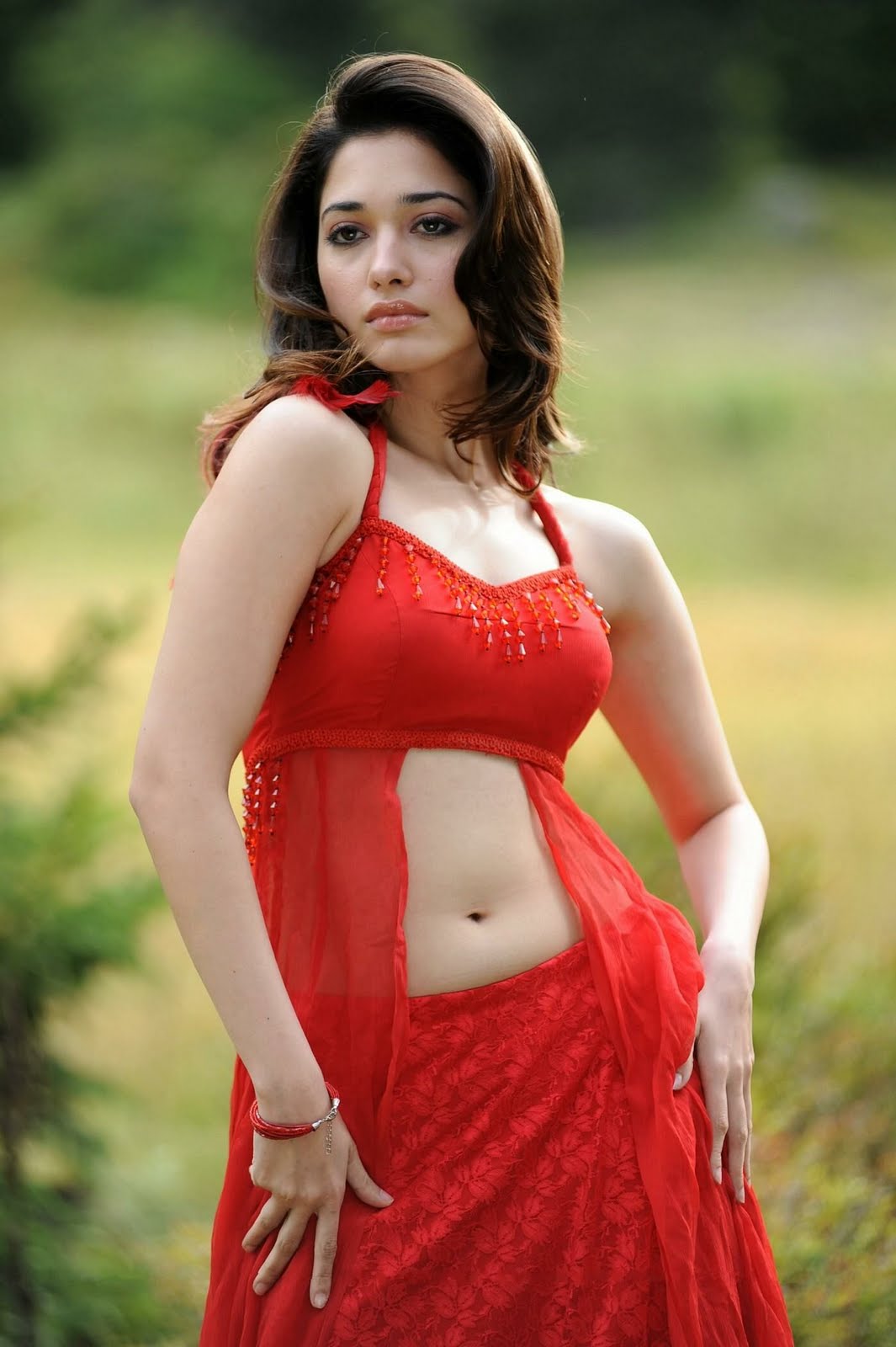 Sab Hot Actress Tamanna Hot Navel Show In Red Dress From Oosaravelli Telugu Movie