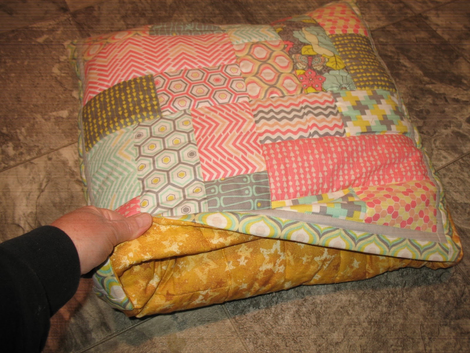 Cat's Crossing Folding a Quillow