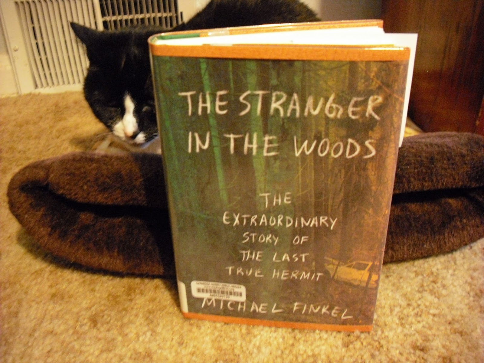 Grab A Book From Our Stack "The Stranger in the Woods" by Michael Finkel