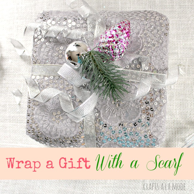 Gift wrapped with a pretty silver scarf