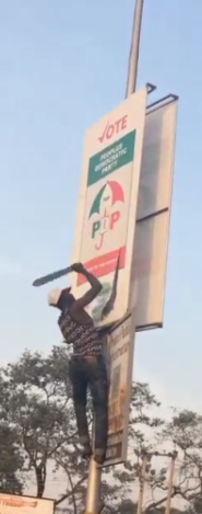 2 See what this man was caught doing to PDP posters in Kaduna
