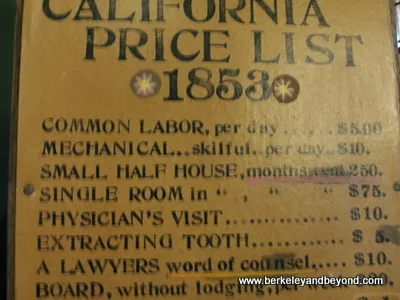 vintage sign displaying 1853 prices in Mariposa Museum and History Center in Mariposa, California
