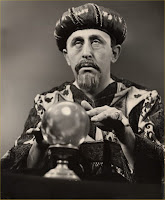 black and white photo of a mystic checking with his chrystal ball