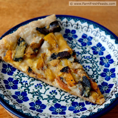 Spicy sriracha-seasoned grilled butternut squash and portobello mushrooms make a winter vegetarian pizza with a kick. You can break out the grill for this one if you dare.