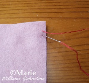 step 2 demonstrating hand sewing stitch