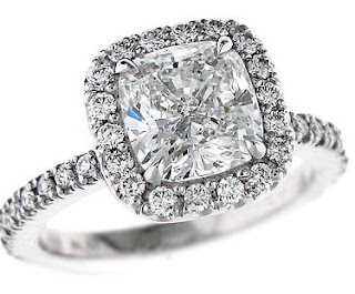 Here a few of the costs of cushion cut diamond engagement rings 