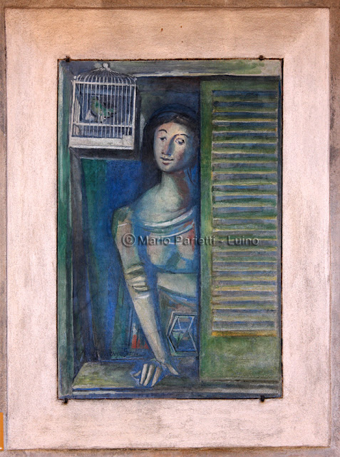 Arcumeggia paese dipinto Affresco di Giovanni Brancaccio: Ragazza alla Finestra