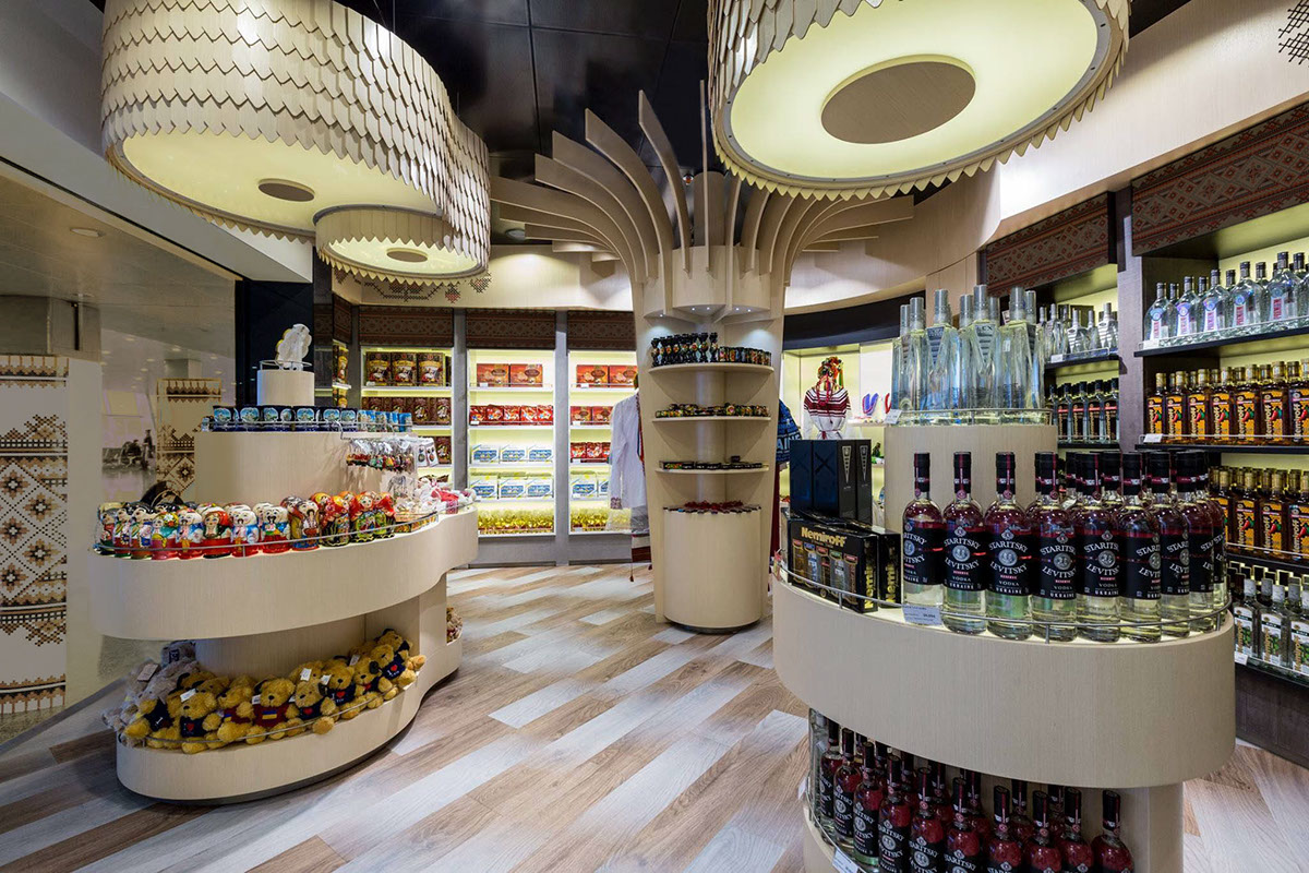 интерьер магазина одежды в стиле. бутик одежды. бутик одежды. вино дьюти фри сочи. товары элиты.