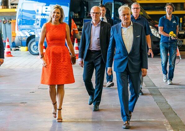 Queen Maxima wore a Natan summer dress in orange. The Queen visited technology facility TechnoHUB in Woerden