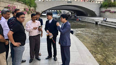 Gopal Mohan on a visit to South Korea with Delhi CM Arvind Kejriwal in Sept 2018