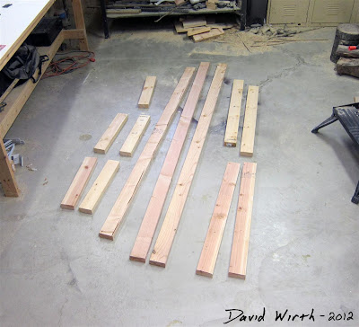 instructions and wood pieces cut out for work bench, 2x4, wood