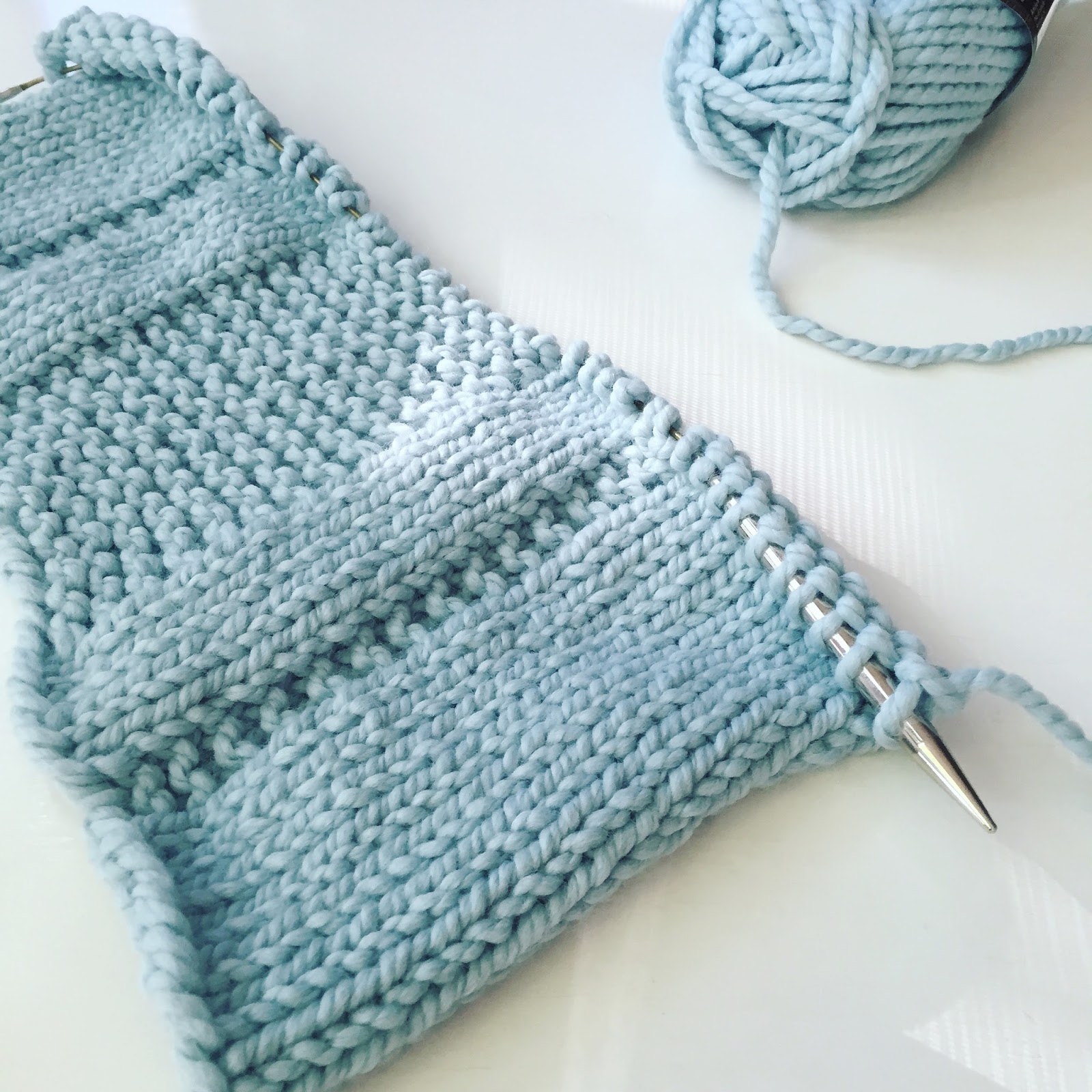 Fifty Four Ten Studio: The Parkway Pillow - My summer knitting project!
