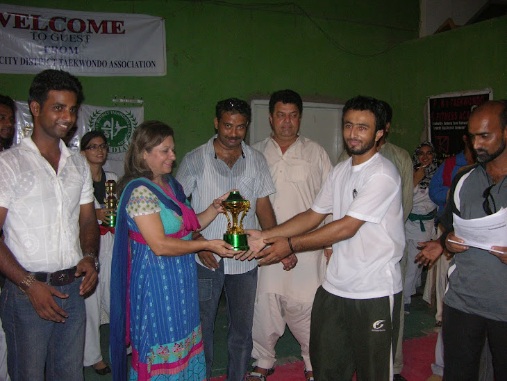 KCDTA Zone 4 Coach rciving 2nd position trophy
