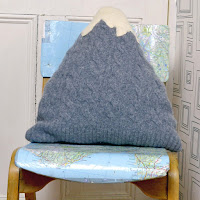 http://www.pillarboxblue.com/upcycled-sweater-mountain-cushion/