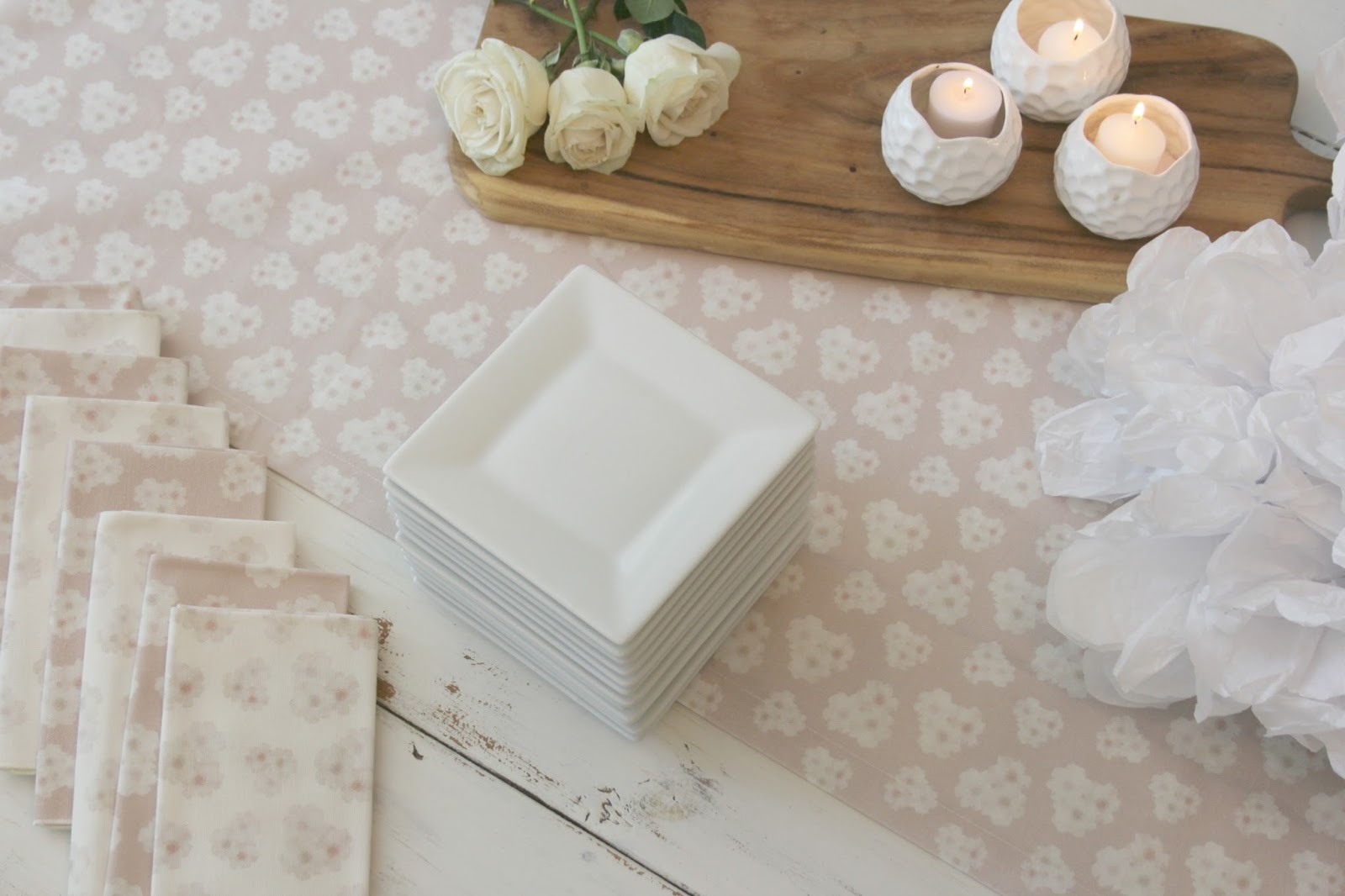 White farm table set with cupcakes and cocktails - Hello Lovely Studio