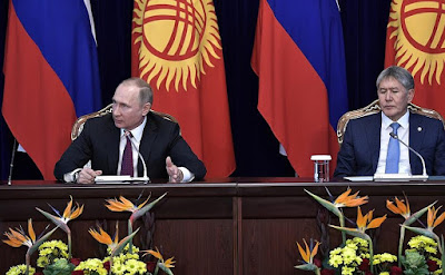 Vladimir Putin and Almazbek Atambayev.