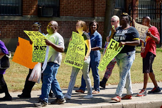 People marching with signs