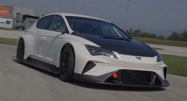 Electric Cupra e-Racer Makes Its Debut On Track With 670HP BY Michael Karkafiris | Posted on July 8, 2018 40 SHARES Share to Facebook FacebookShare to WhatsApp WhatsAppShare to Messenger MessengerShare to Twitter TwitterShare to Reddit RedditShare to Pinterest Pinterest Cupra, Seat’s performance sub-brand, has completed the first shakedown of the e-Racer on track and released the first figures of its upcoming electric racing car. The rear-wheel drive, Leon-based Cupra e-Racer, features a 65kWh battery pack with 6,072 cells, which is equivalent to 9,000 mobile phones, and makes 402hp (407PS) of continual power and 670hp (680PS) of peak power. According to Cupra, the electric touring racecar can sprint from 0 to 62mph (100km/h) in 3.2 seconds and to 124mph (200km/h) in 8.2 seconds. Cupra took the e-Racer for its first real-world dynamic debut at a track in Zagreb, Croatia, testing the operation of the electrical components, the battery pack and the cooling and propulsion systems together for the first time. The company said that the first results are very optimistic, especially considering the high temperature conditions at the track. The race car’s chassis is based on the existing Cupra Leon TCR that competes in the World Touring Car Cup. The e-Racer is the first touring car that complies with the rules in the new E TCR series, the first electric multi-brand touring car championship. “With the CUPRA e-Racer we want to bring racing to the next level. We believe we can help reinvent motorsport and achieve success. Motorsport is one of the pillars of CUPRA, and we are proud of the team that is making this electric touring racecar possible”, read Seat’s official press release. TagsCupra, Motorsport, Racing, SEAT, Seat Leon, Seat Leon Cupra, Seat Videos, Video