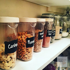 Organized Kitchen Pantry - use chalk in markers and clear containers to label :: OrganizingMadeFun.com