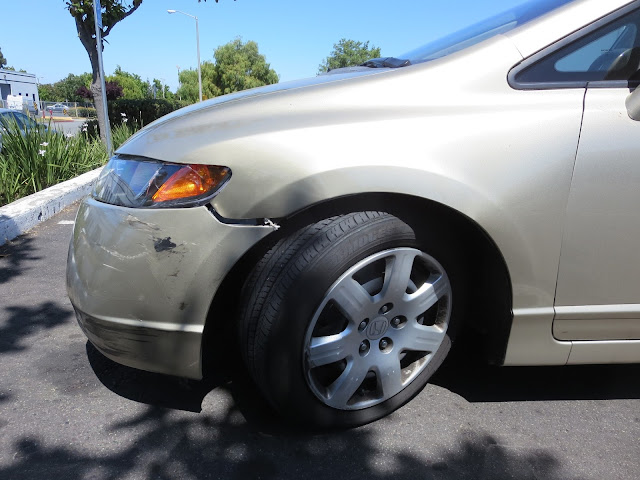 2008 Honda Civic with damage to fender, bumper and headlamp prior to repairs