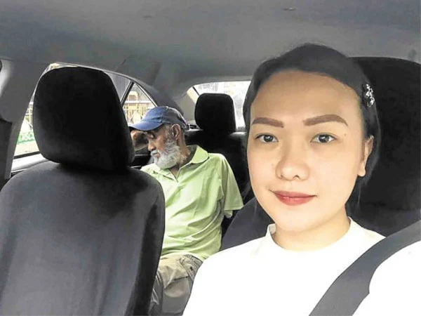 Woman passenger drives taxi so cabbie can rest