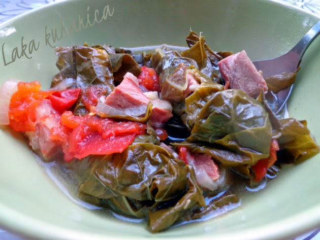 Collard greens with ham and tomato by Laka kuharica; greens and ham, brightened with a splash of cider vinegar.