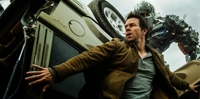 Image of Mark Wahlberg and Autobots in Transformers Age of Extinction