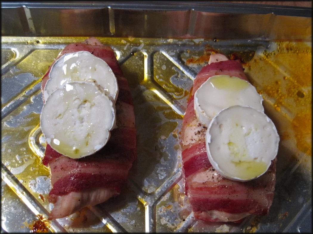 Bacon Wrapped Chicken with Goats Cheese almost cooked