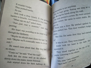 Book with many lines of text on each page.