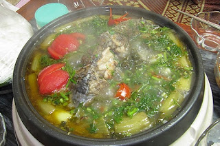 Đổi vị với món lẩu cá chép om dưa bằng bếp lẩu điện Lau-ca-chep-om-dua
