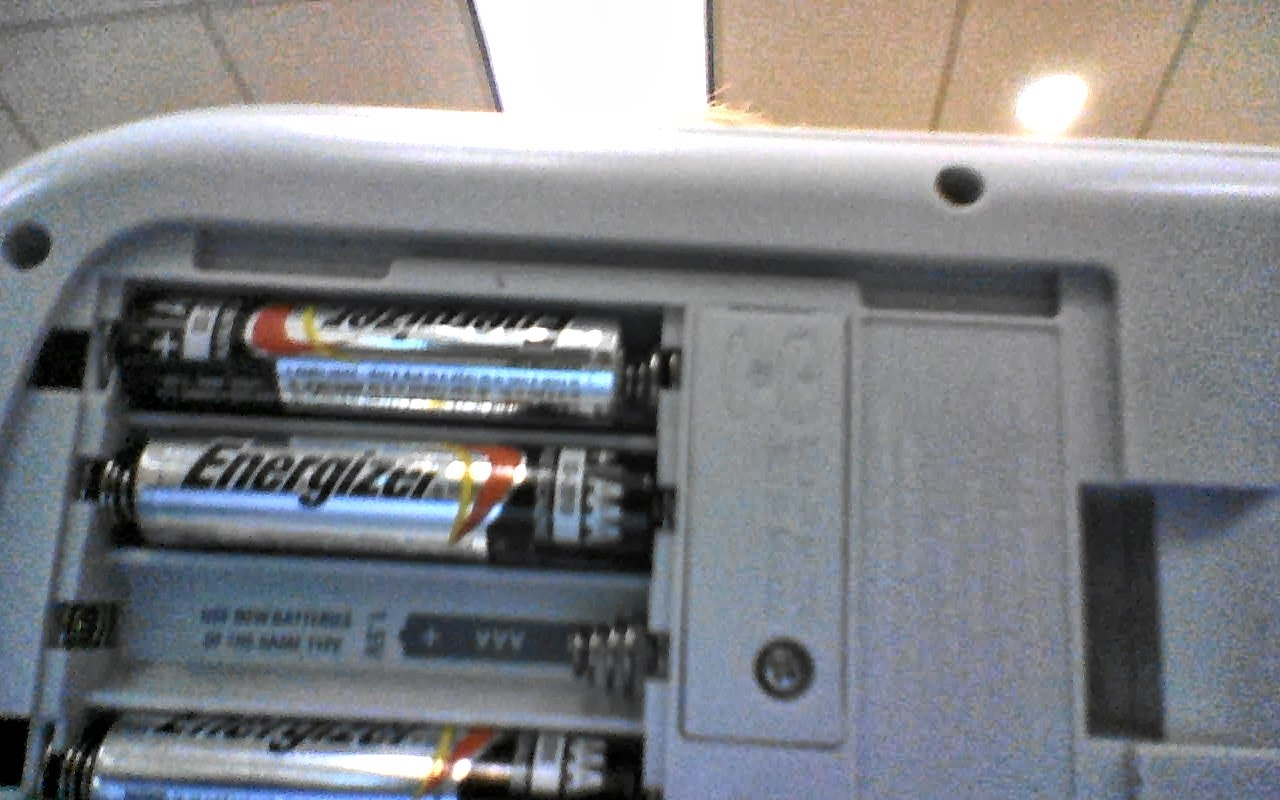 How Things Work Battery compartment of a calculator, springs