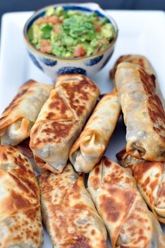 Baked and healthy Southwestern Eggrolls from SixSistersStuff.com | These actually get crispy! Can add chicken for extra protein to make a meal your family will love!