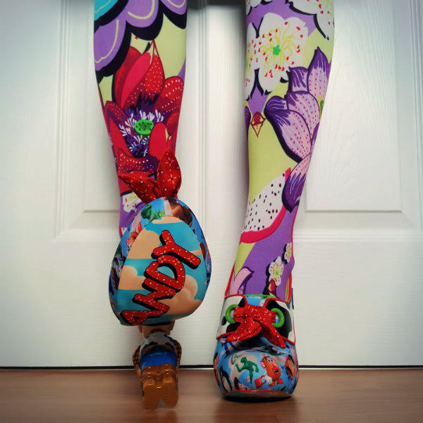 Irregular Choice You've Got A Friend In Me sole legs facing forward with foot lifted to show Andy printed on sole