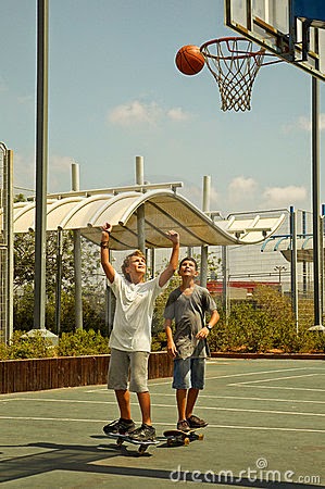 two-boys-playing-basketball-16477199.jpg