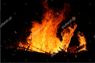 The witch who hides in the fire, unreal view of the feast of San Juan, traditional bonfire of San Juan,witch figure out the flames,traditional bonfire Galicia Spanish festivals and tourist attractions The witch who hides in the fire, unreal view of the feast of San Juan, traditional bonfire of San Juan,witch figure out the flames,traditional bonfire Galicia Spanish festivals and tourist attractions