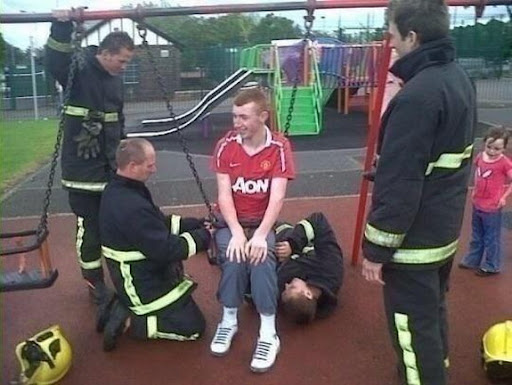 Man Utd fan trapped in child's swing