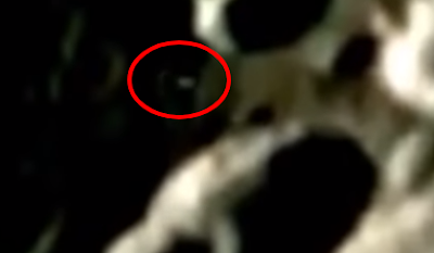 Lunar UFO is coming out the crater. Lunar UFO is coming out the crater.