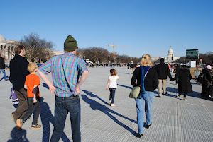 Almost no one but us walking the Mall! Underfoot is grass protection.