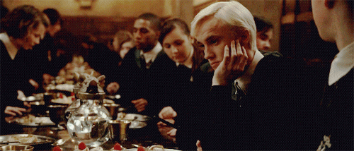 Draco alone in a crowd gif