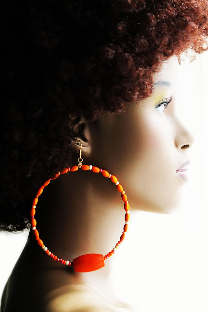 african orange beaded hoop earrings