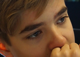 Picture of a thoughtful boy. Picture of a thoughtful boy.