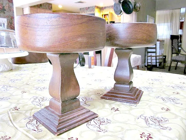 Before picture of wooden bowls on top of candle sticks