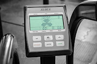 Xebex Air Bike's console, displays pace time, speed, distance, watts, calories, heart rate
