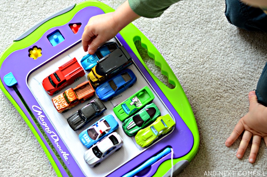 Open-ended play for kids with cars and a Magna-Doodle from And Next Comes L