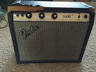Beat up Fender Champ Silverface amplifier