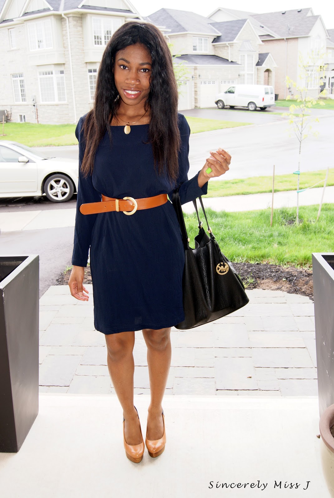 navy blue dress and lovely shoes complement the look of Canada style blogger Jackline 