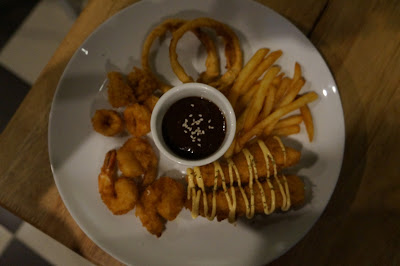 Seafood platter with brown sauce